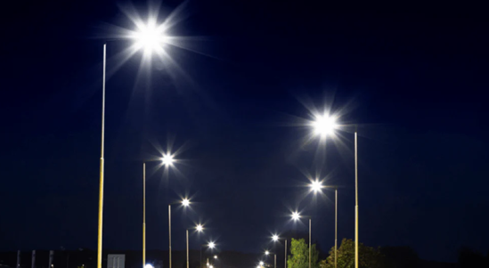 Street lights on roadway at night